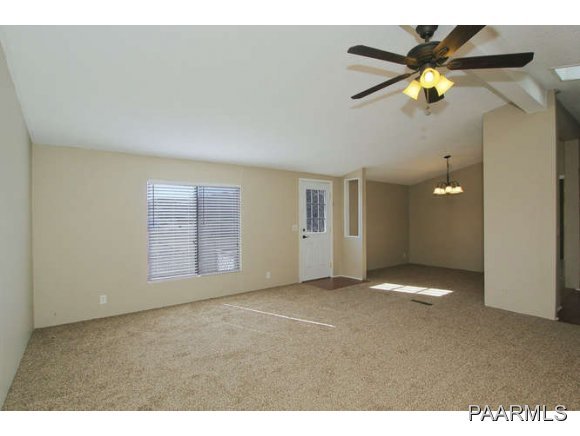 4430 East Waldron Road Rimrock, AZ 86335 - Photo 5 of 24 a view of an empty room with a window