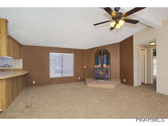 4430 East Waldron Road Rimrock, AZ 86335 - Photo 8 of 24 a big room with closet and a chandelier fan