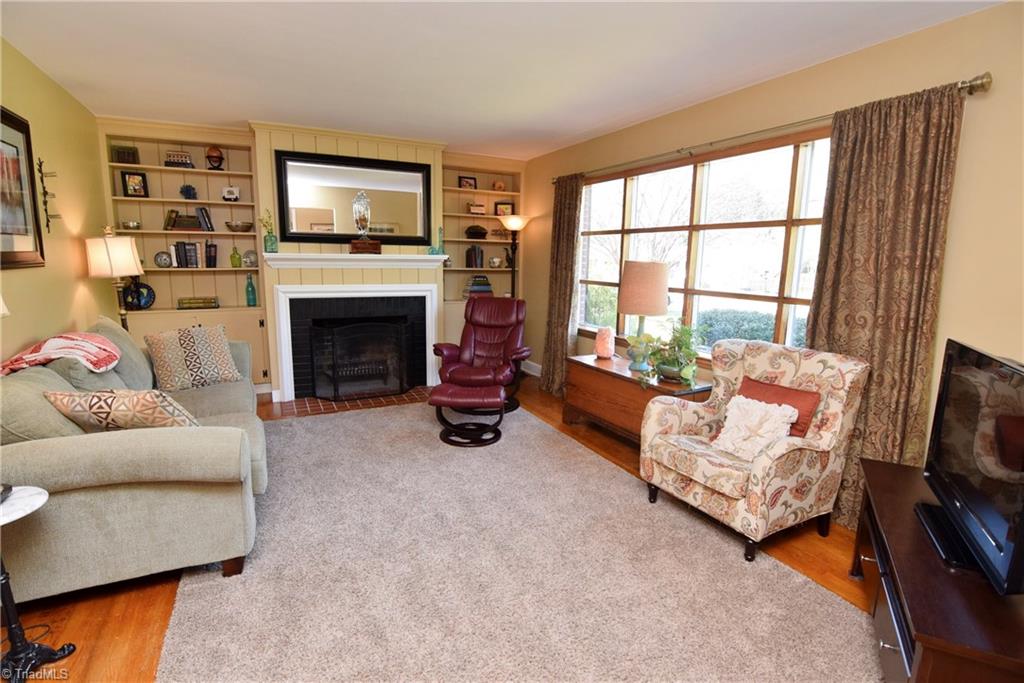 108 Kirk Road Greensboro, NC 27455 - Photo 3 of 30 The living room has a lot of natural light!