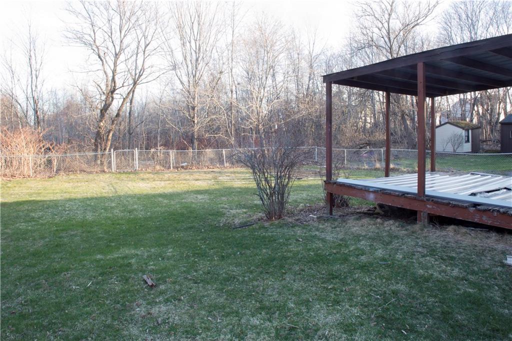 15 Call Road Milford, ME 04461 - Photo 26 of 27 Large fenced in backyard with deck...