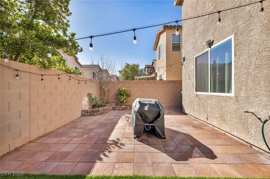 854 Earth Luster Road Las Vegas, NV 89178 - Photo 13 of 65 View of patio / terrace featuring a fenced backyard and a grill
