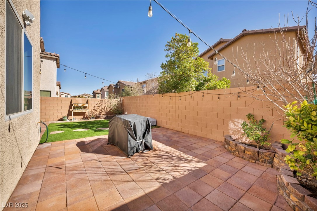 854 Earth Luster Road Las Vegas, NV 89178 - Photo 15 of 65 View of patio / terrace with a fenced backyard and area for grilling