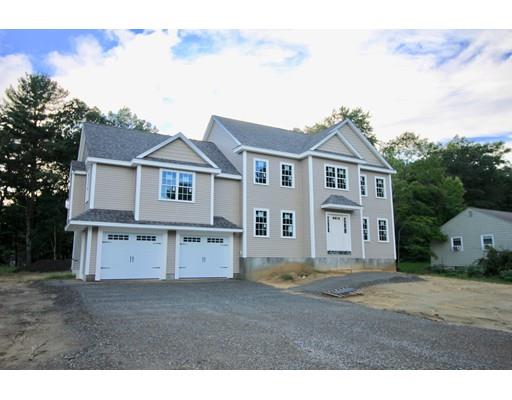 43 Bellflower Road Billerica, MA 01821 - Photo 1 of 13 a view of a big house with a big yard and large trees