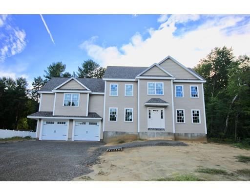 43 Bellflower Road Billerica, MA 01821 - Photo 2 of 13 a view of a big house with a big yard and large tree