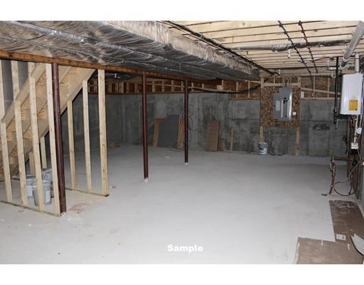 43 Bellflower Road Billerica, MA 01821 - Photo 7 of 13 a view of a room with wooden walls