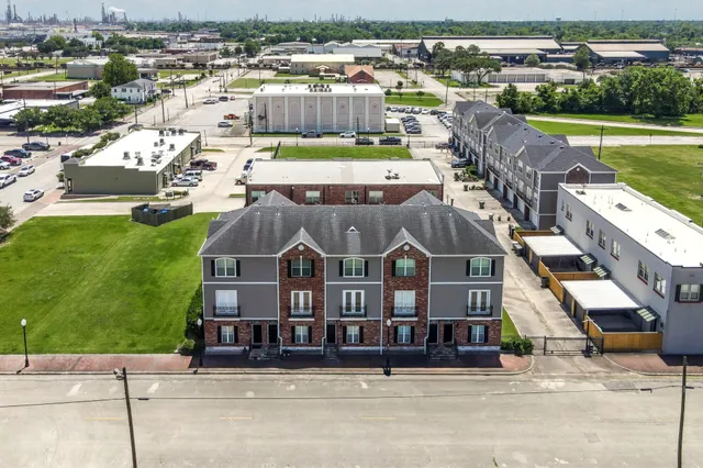 a view of building with outdoor space and river