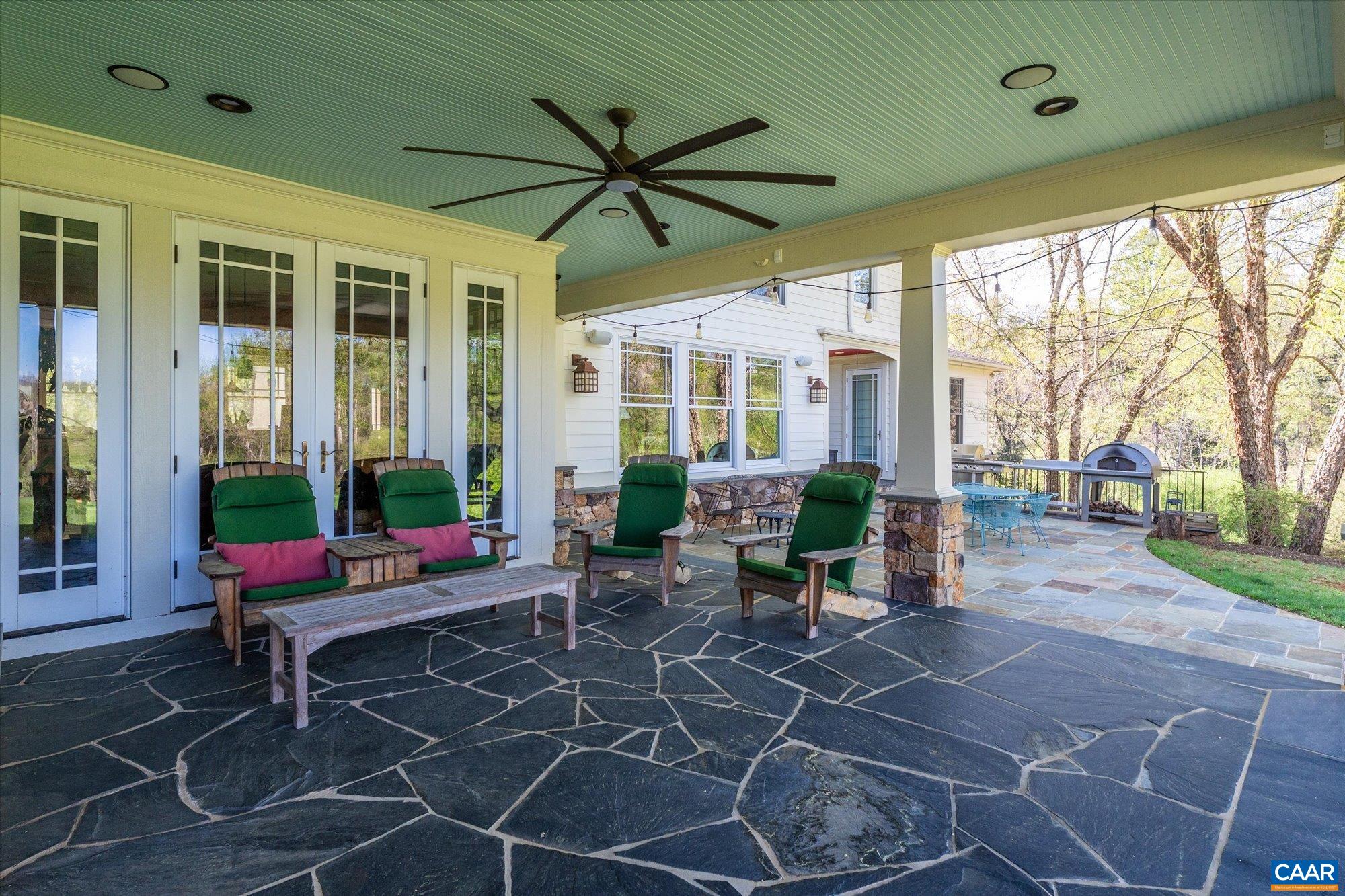 3135 Rocks Farm Court Charlottesville, VA 22903 - Photo 53 of 75 a living room with patio furniture and garden