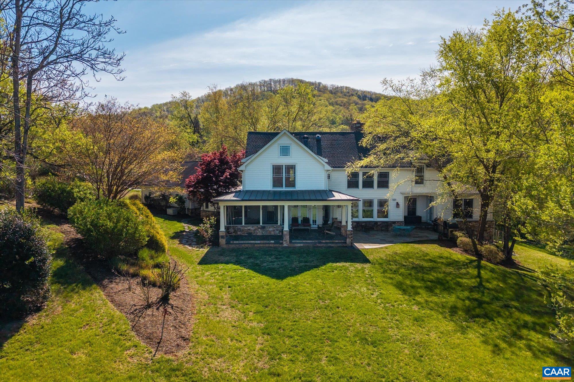 3135 Rocks Farm Court Charlottesville, VA 22903 - Photo 62 of 75 a view of a house with a big yard and potted plants