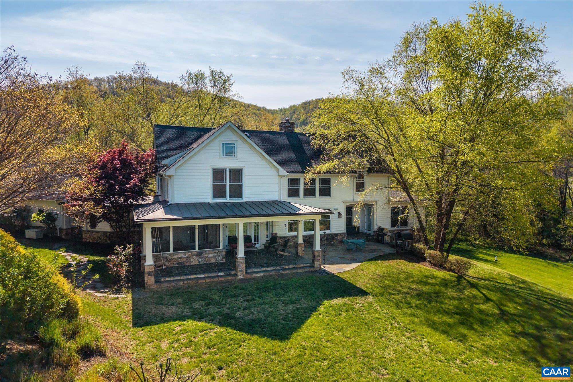 3135 Rocks Farm Court Charlottesville, VA 22903 - Photo 63 of 75 a view of house with a big yard and large trees
