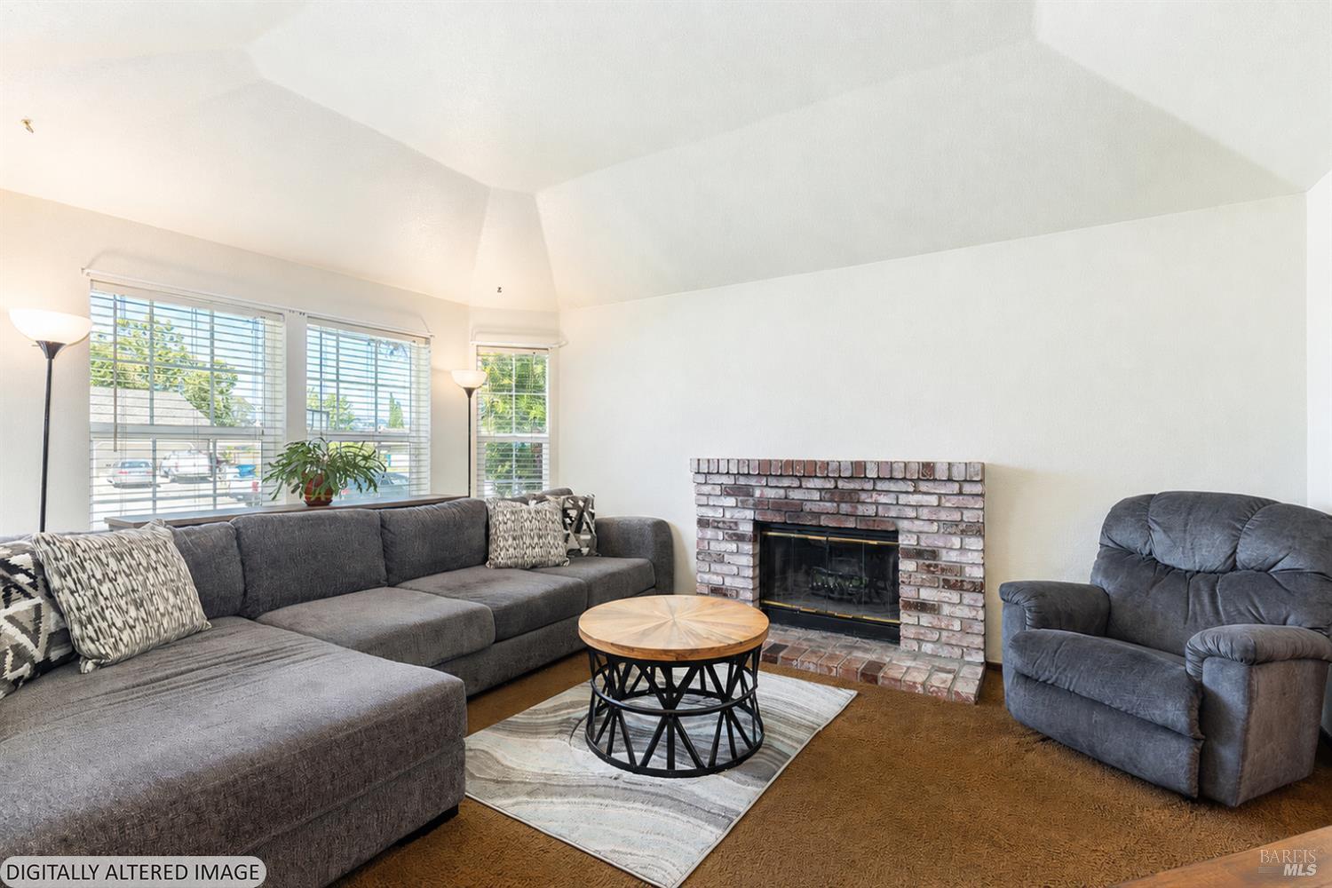 1935 Seville Street Santa Rosa, CA 95403 - Photo 3 of 30 a living room with furniture and a fireplace