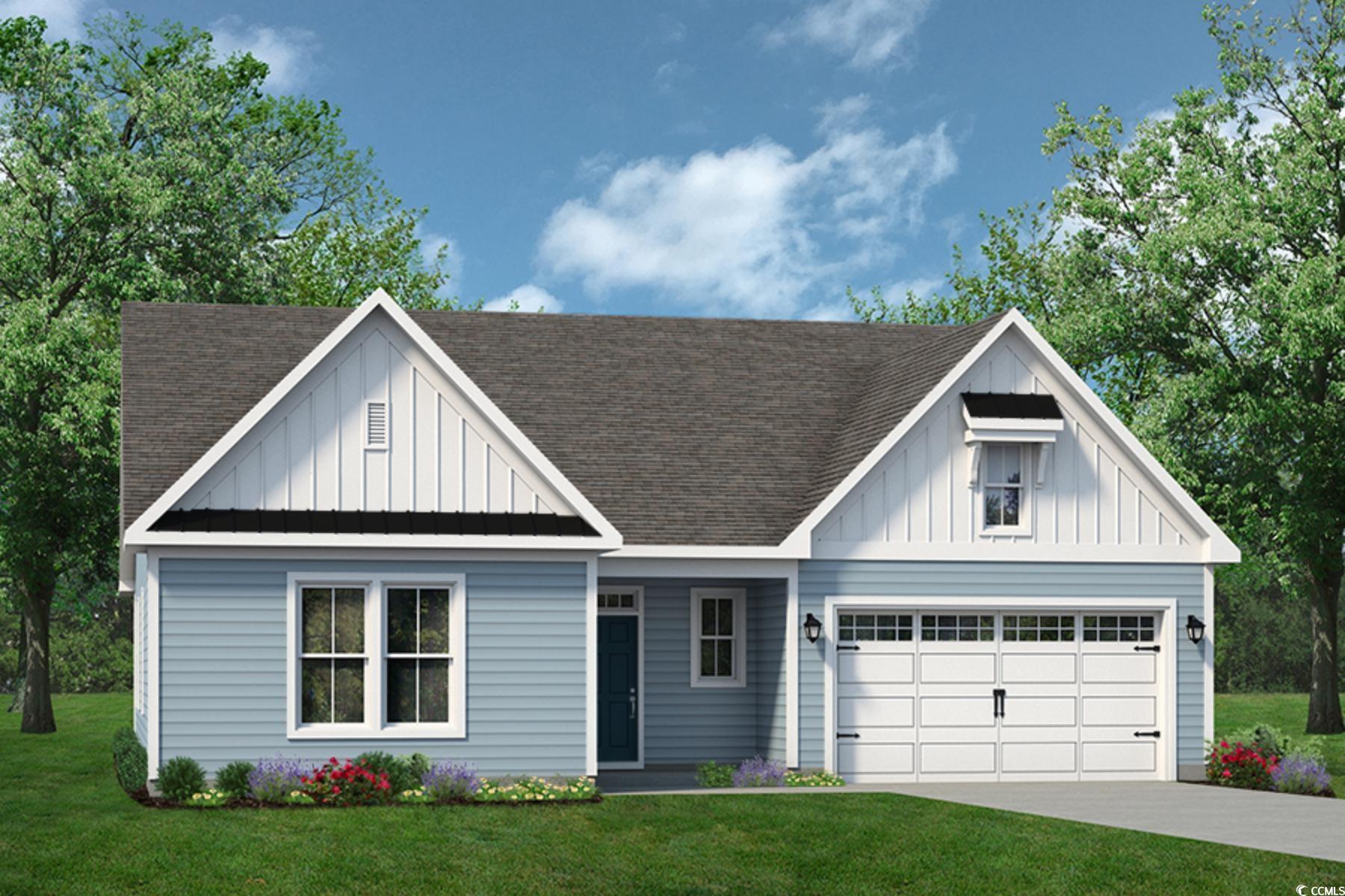 1958 Woodrush Loop Little River, SC 29566 - Photo 23 of 33 View of front of house featuring a front lawn