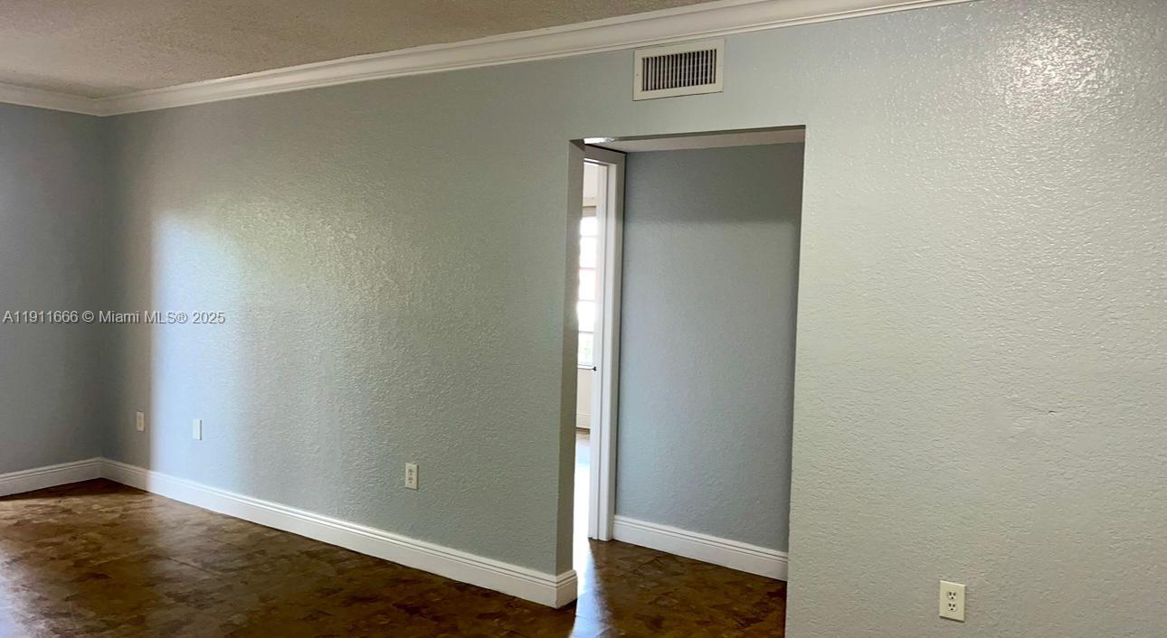 575 West 69th Street, Unit 208 Hialeah, FL 33014 - Photo 4 of 10 a view of an empty room