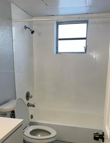 a view of a small space with a window