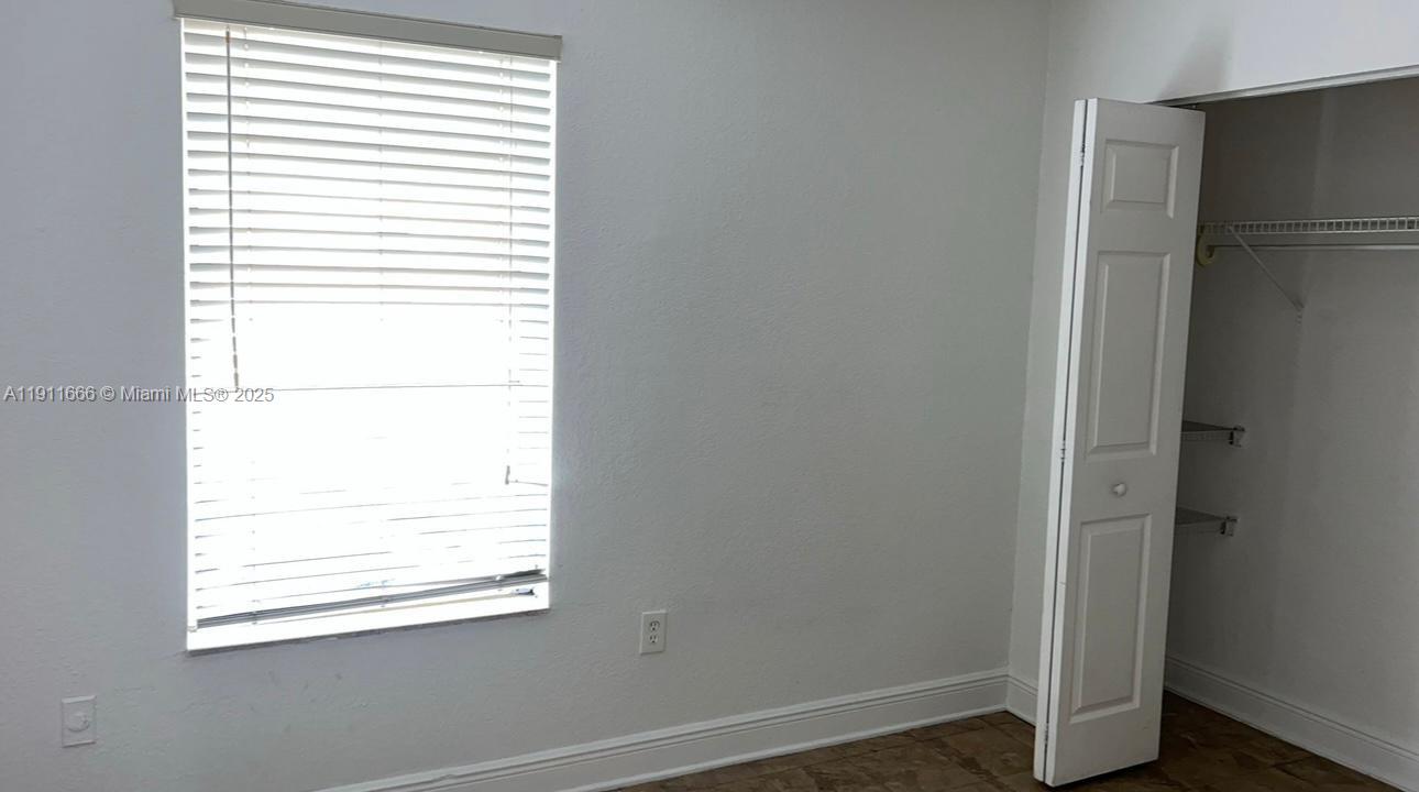 575 West 69th Street, Unit 208 Hialeah, FL 33014 - Photo 10 of 10 a view of a small space with a window