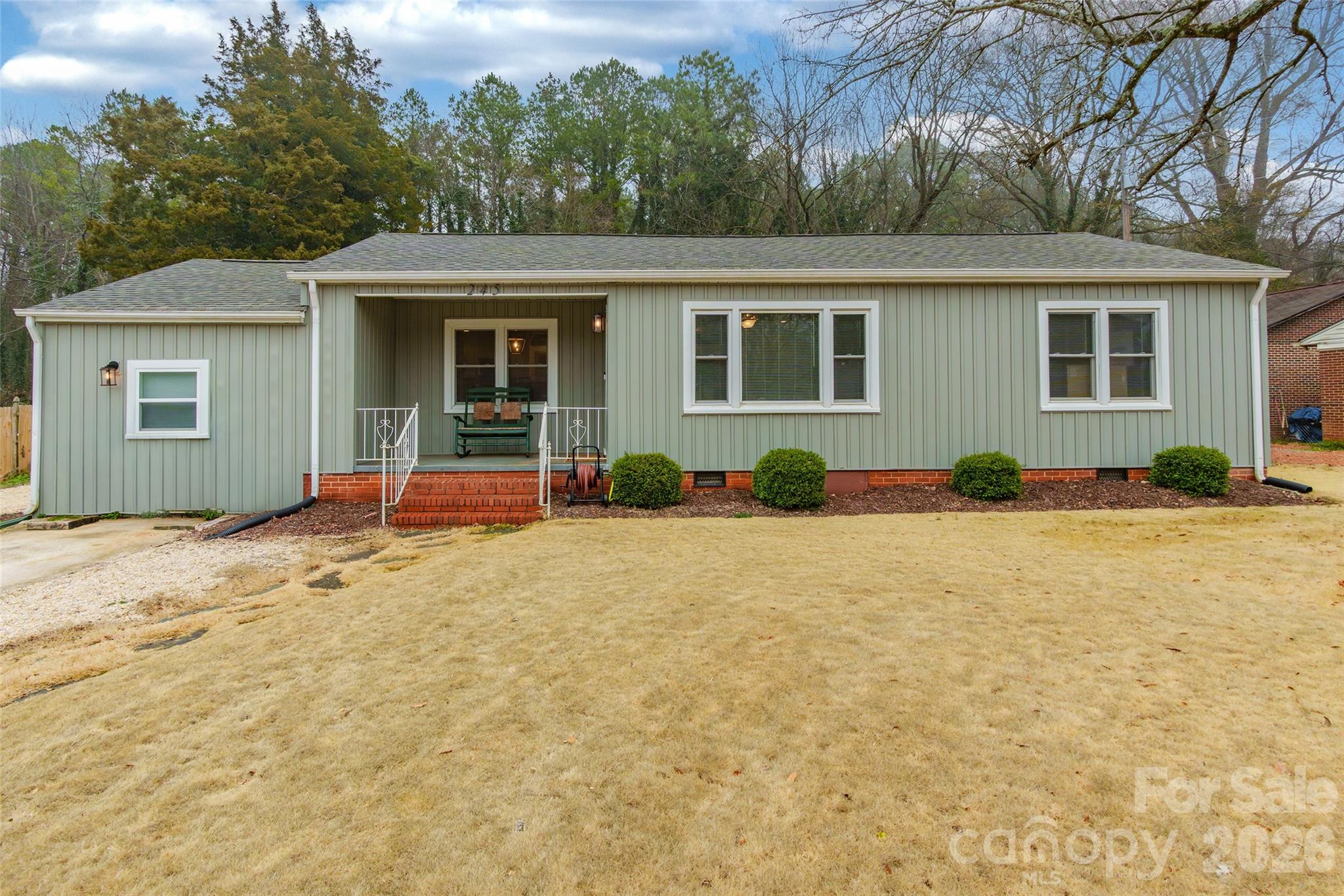 245 Mellon Road Belmont, NC 28012 - Photo 1 of 30 a front view of a house with a yard
