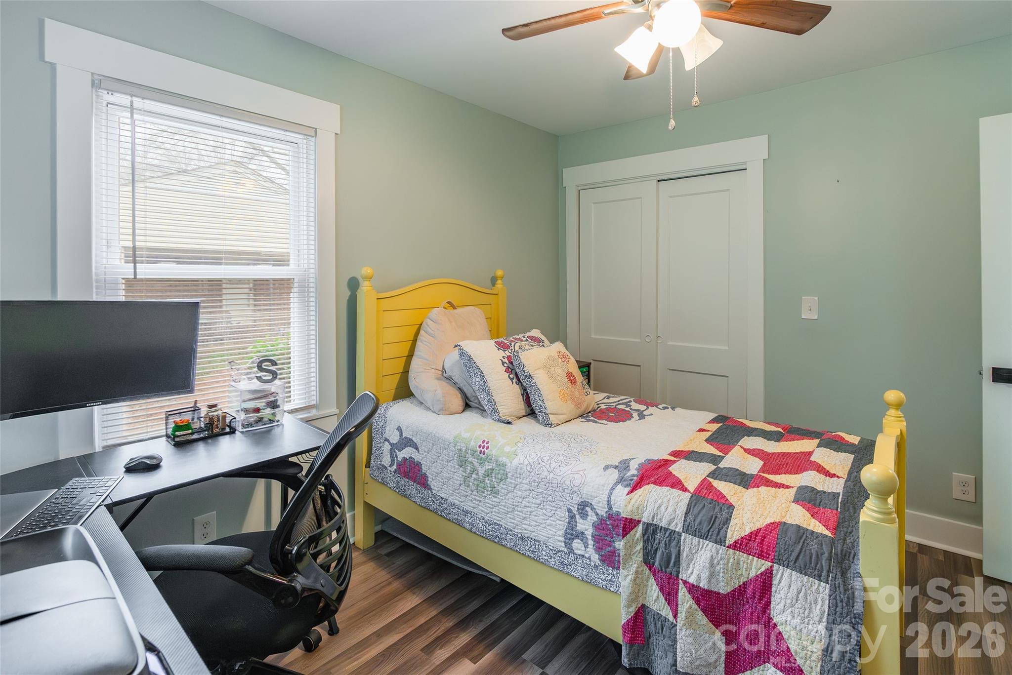 245 Mellon Road Belmont, NC 28012 - Photo 17 of 30 a bedroom that has a bed window and a table in it