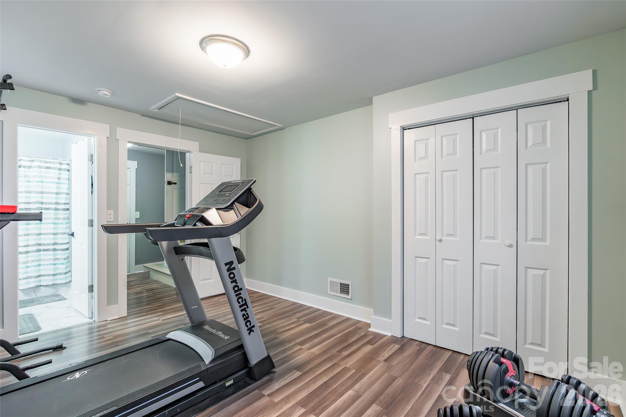 245 Mellon Road Belmont, NC 28012 - Photo 22 of 30 a view of a room with gym equipment