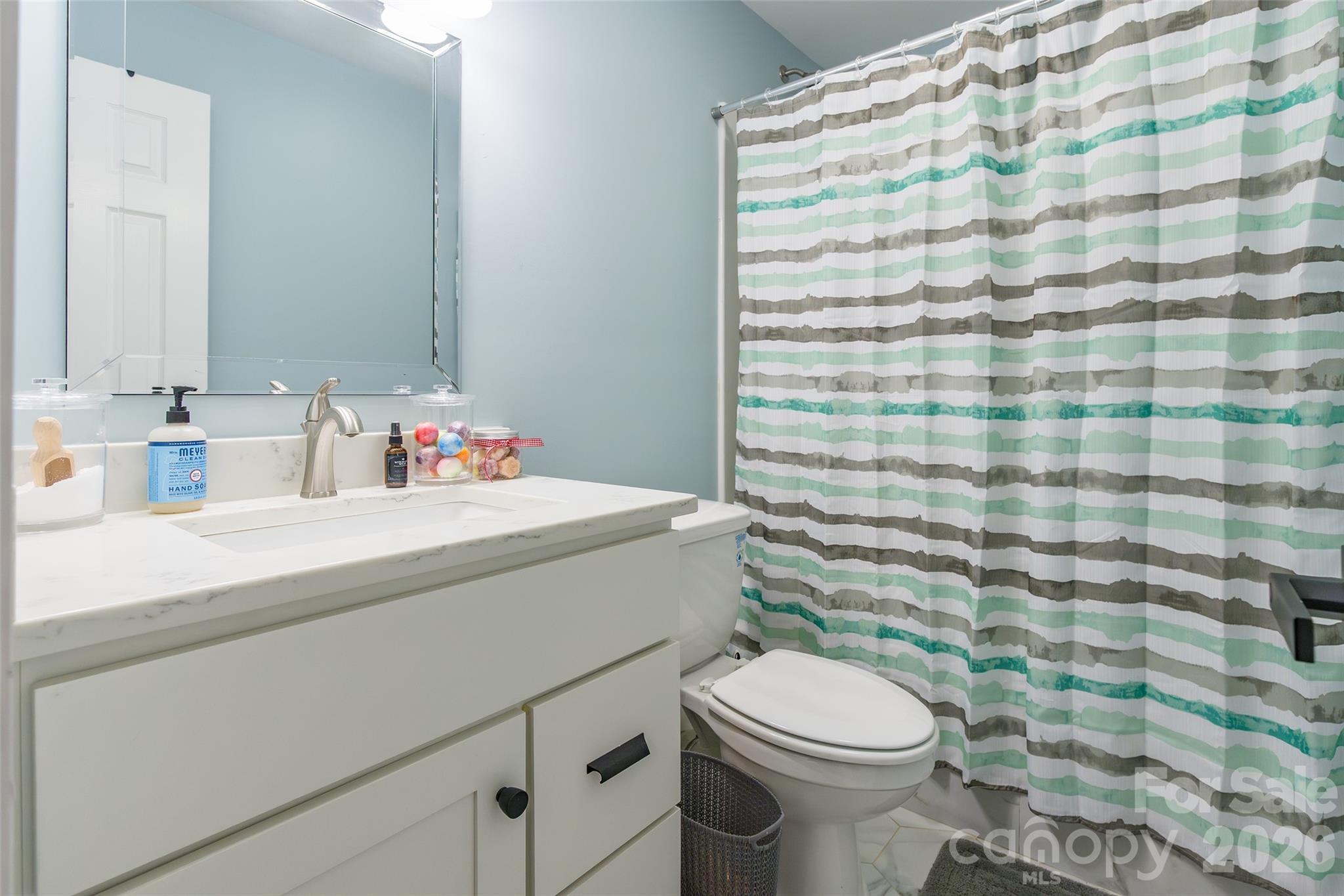 245 Mellon Road Belmont, NC 28012 - Photo 23 of 30 a bathroom with a sink toilet and shower
