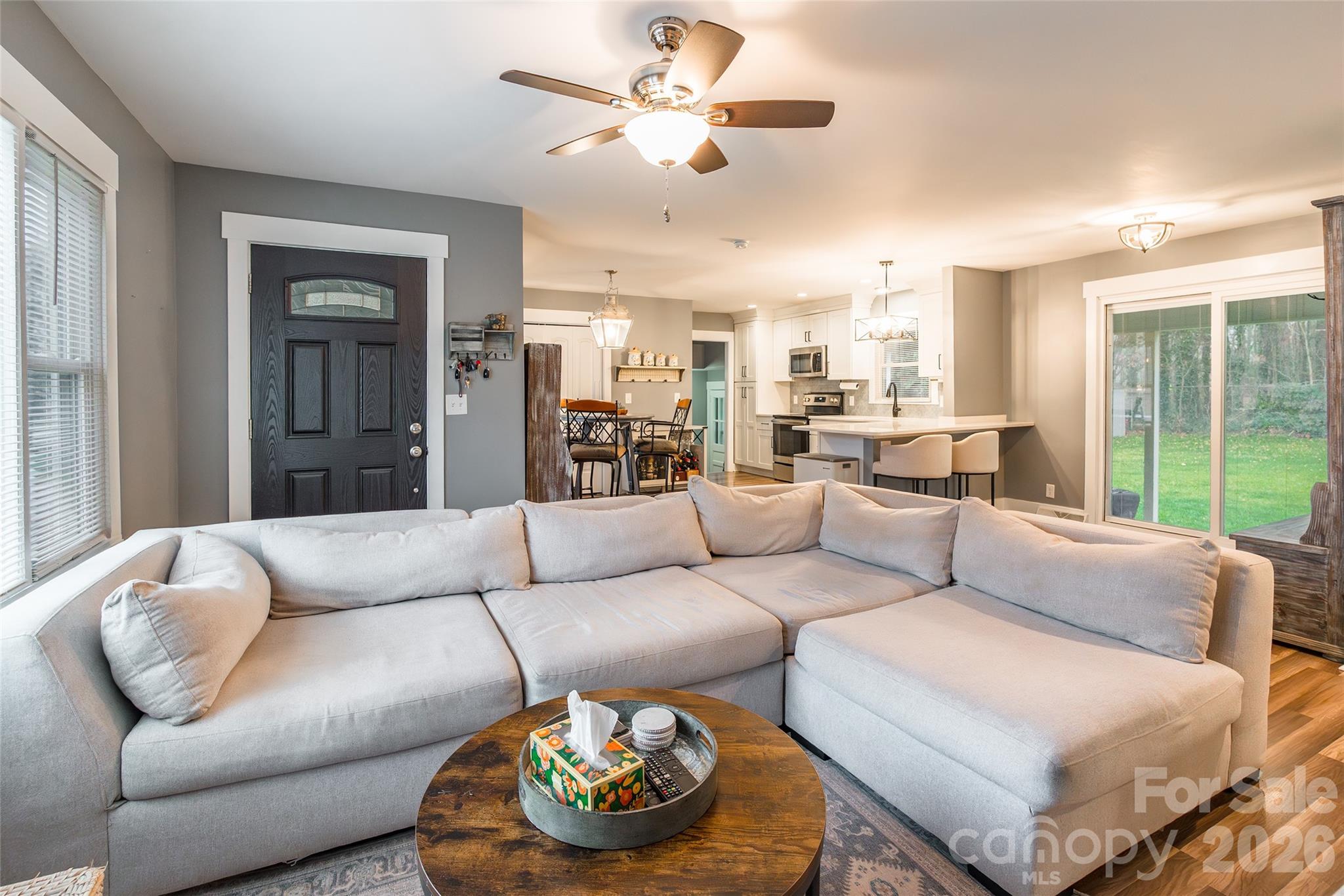 245 Mellon Road Belmont, NC 28012 - Photo 5 of 30 a living room with furniture and a large window