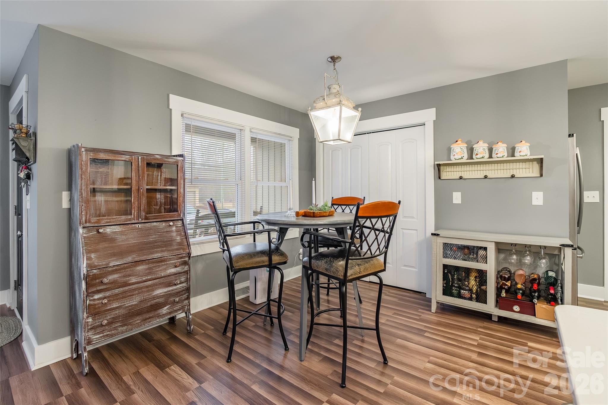 245 Mellon Road Belmont, NC 28012 - Photo 8 of 30 a dining room with furniture and wooden floor