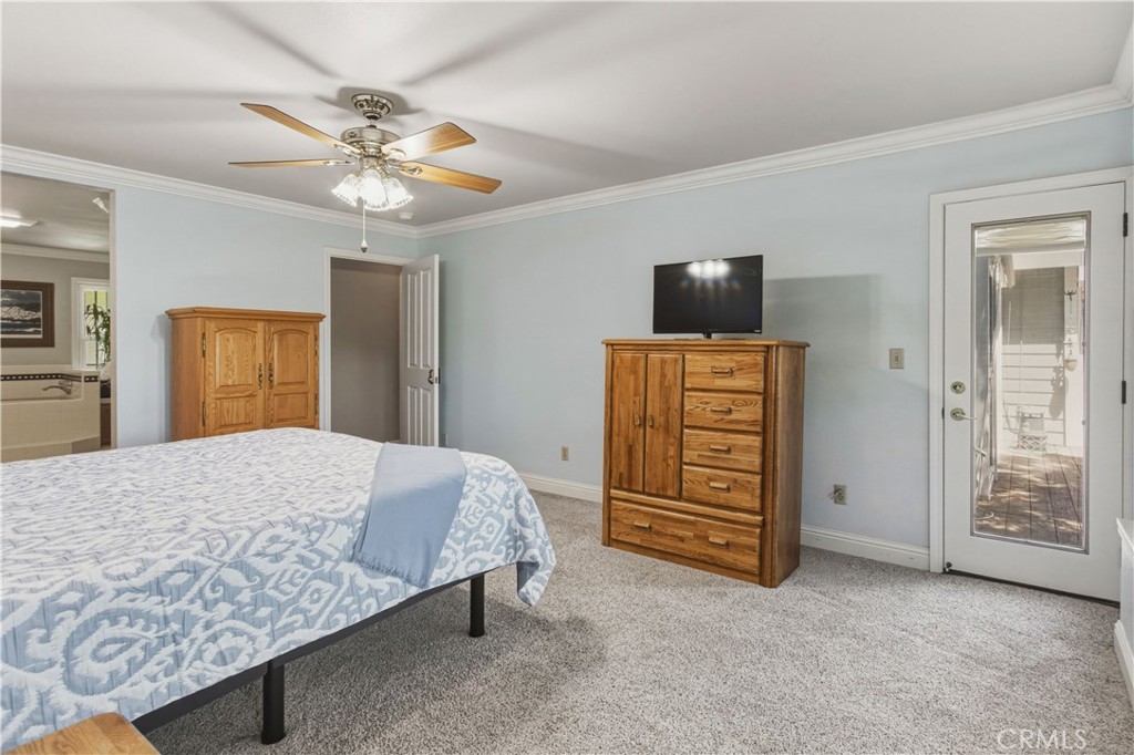 3856 North Gardner Avenue Merced, CA 95340 - Photo 23 of 59 a bedroom with a bed and a walk in closet