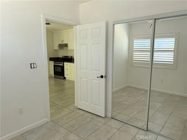 a bathroom with a shower and a sink