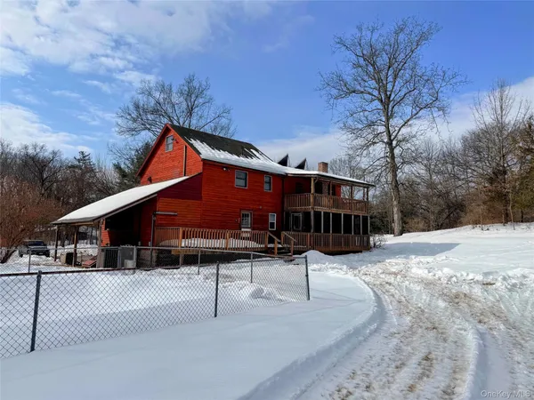 a house with trees in the background