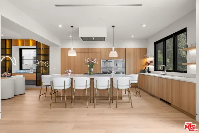 a bathroom with a toilet a sink and shower