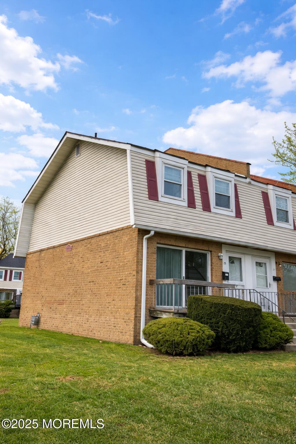 23 Primrose Lane Brick, NJ 08724 - Photo 1 of 22 a front view of a house with a yard