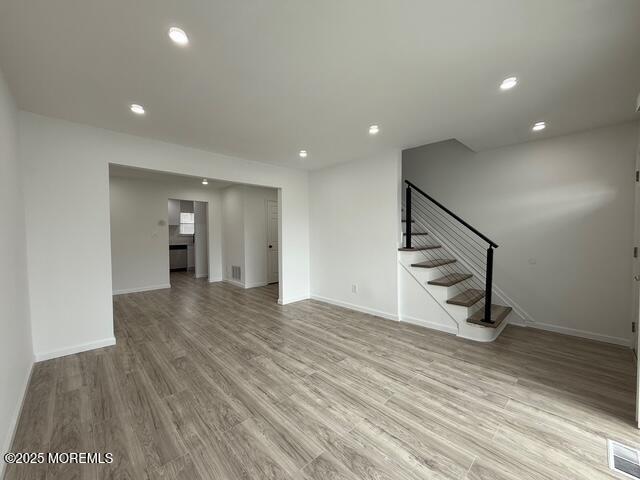 23 Primrose Lane Brick, NJ 08724 - Photo 4 of 22 a view of entryway and hall with wooden floor
