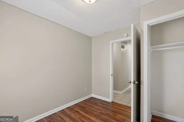 a view of small space with wooden floor