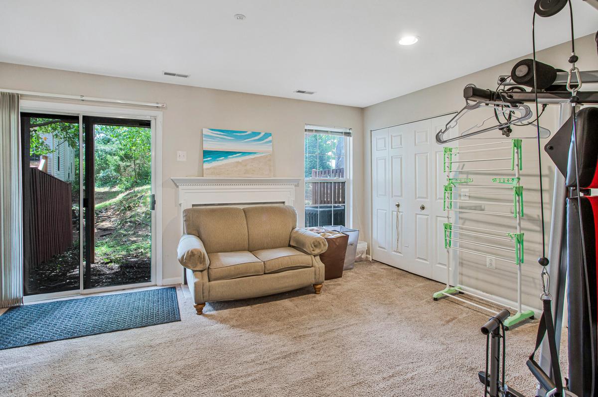 648 Howards Loop, Unit 19 Annapolis, MD 21401 - Photo 30 of 35 Cozy 1st floor w/ fireplace & 1/2b, -to outside.
