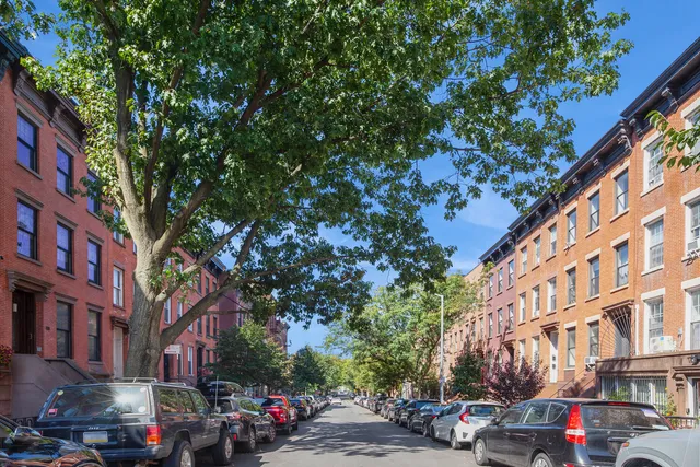 a picture of a bathroom with a shower