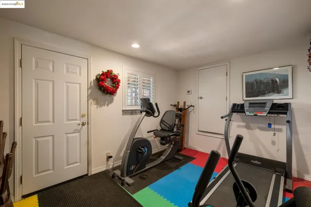 a view of a room with gym equipment