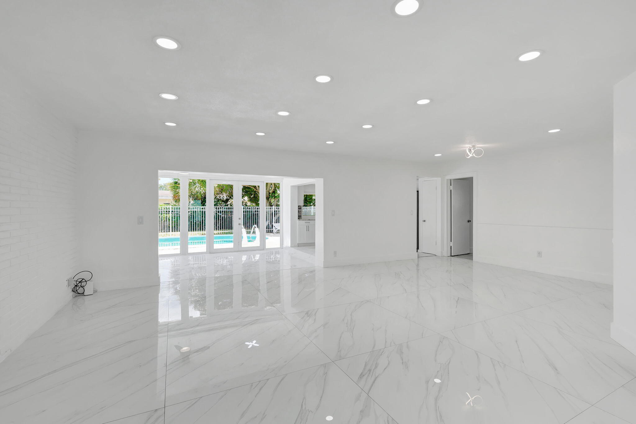 334 Southwest 13th Avenue Boynton Beach, FL 33435 - Photo 11 of 41 a view of an empty room with a window
