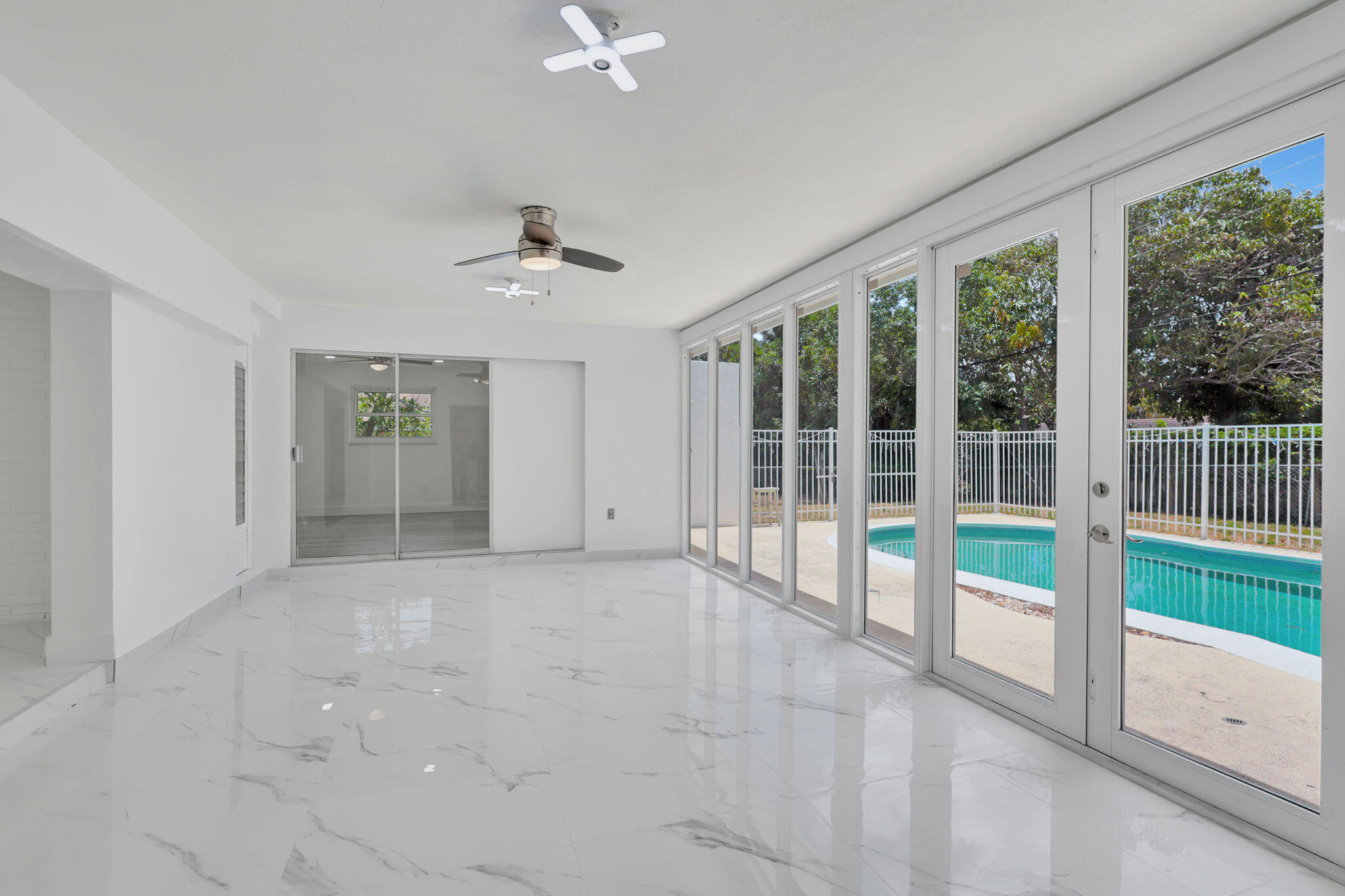 334 Southwest 13th Avenue Boynton Beach, FL 33435 - Photo 12 of 41 a view of an empty room with a window