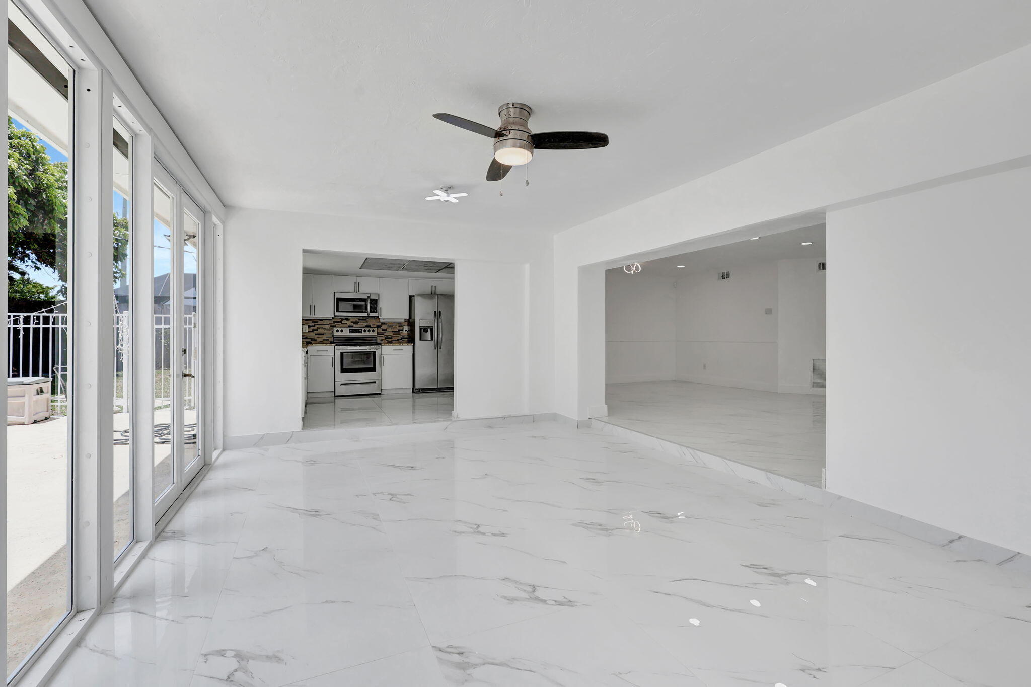 334 Southwest 13th Avenue Boynton Beach, FL 33435 - Photo 16 of 41 a view of an empty room with a window