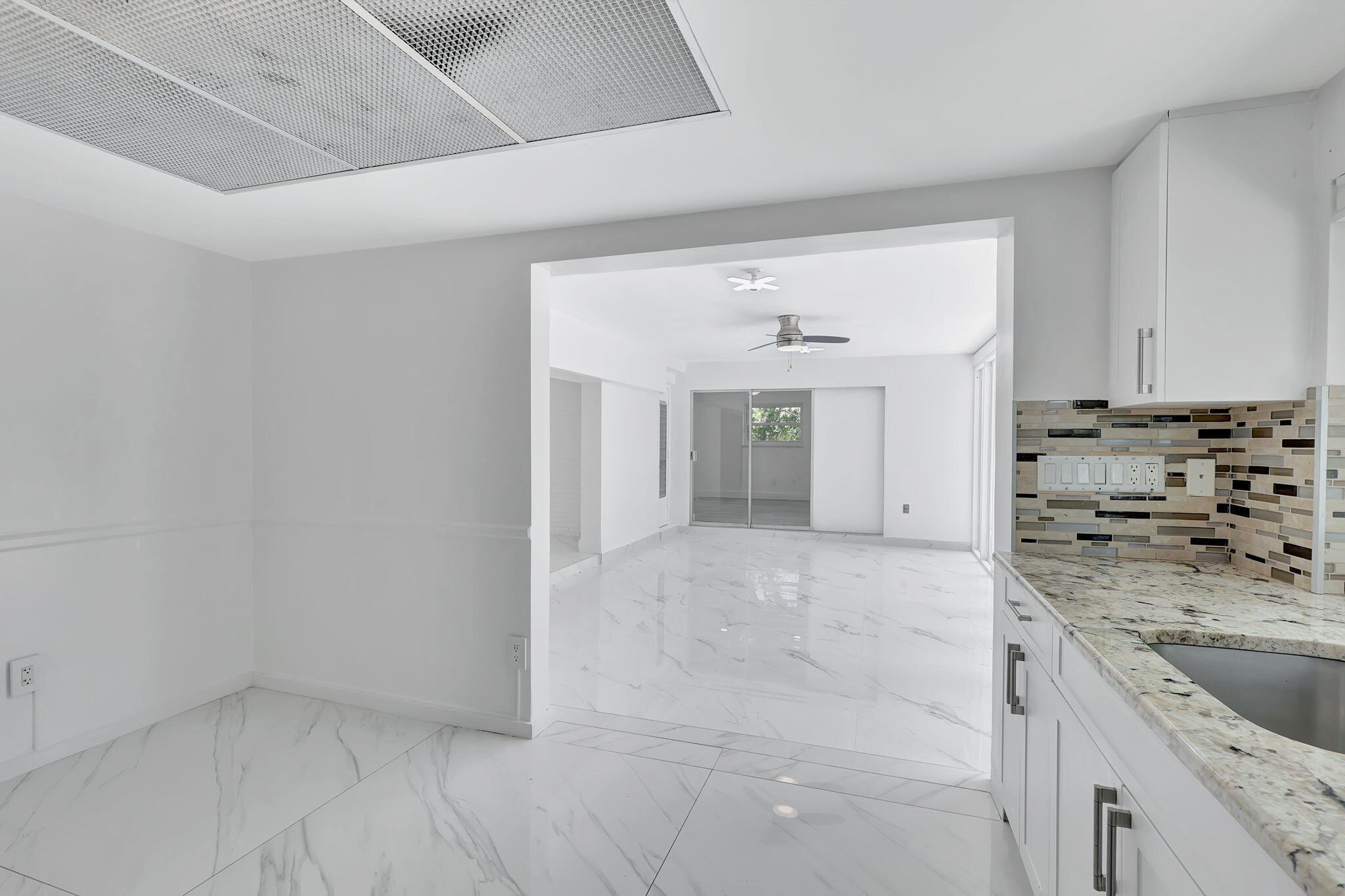 334 Southwest 13th Avenue Boynton Beach, FL 33435 - Photo 17 of 41 a view of a kitchen with a sink