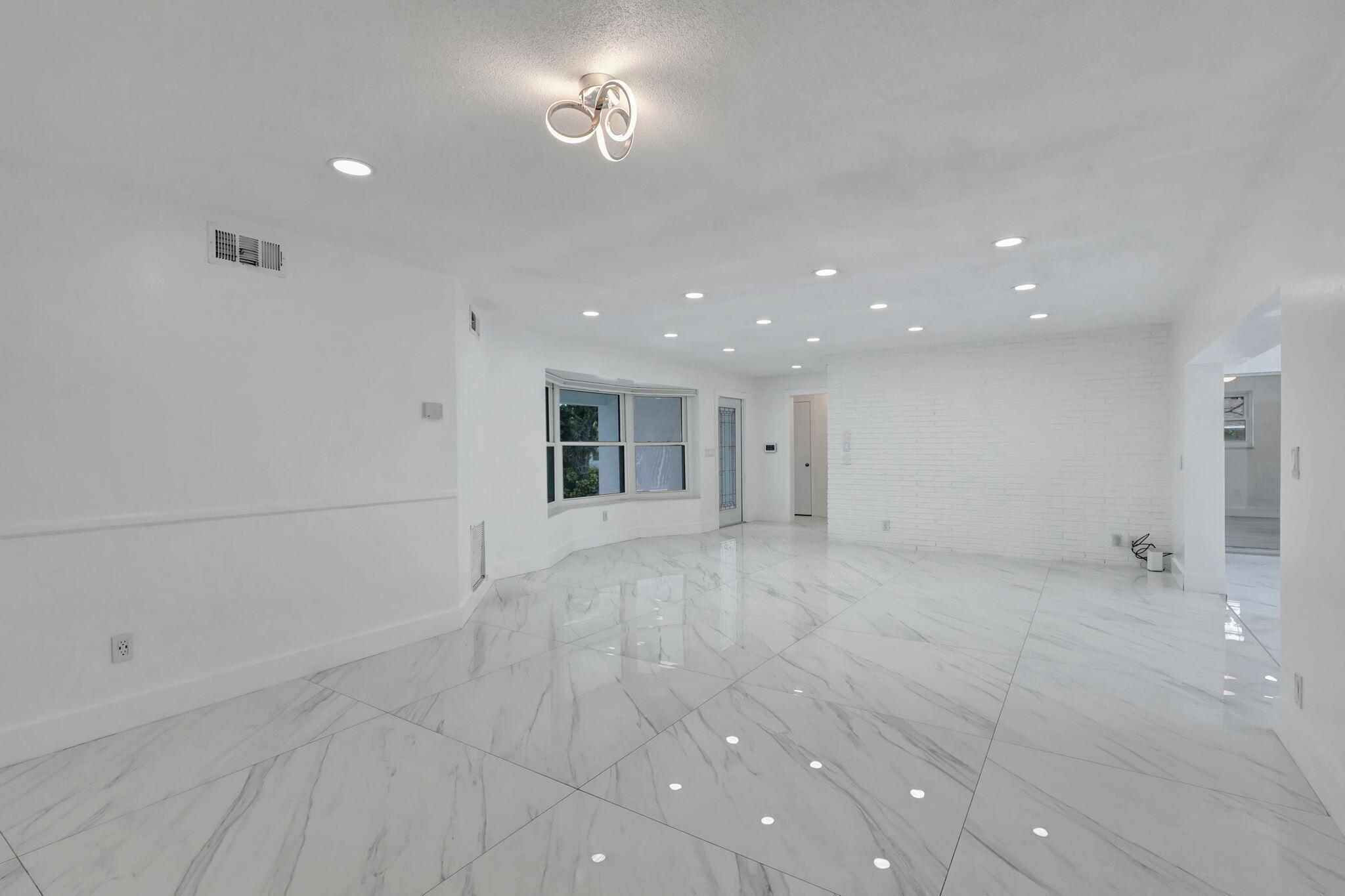 334 Southwest 13th Avenue Boynton Beach, FL 33435 - Photo 18 of 41 a view of an empty room