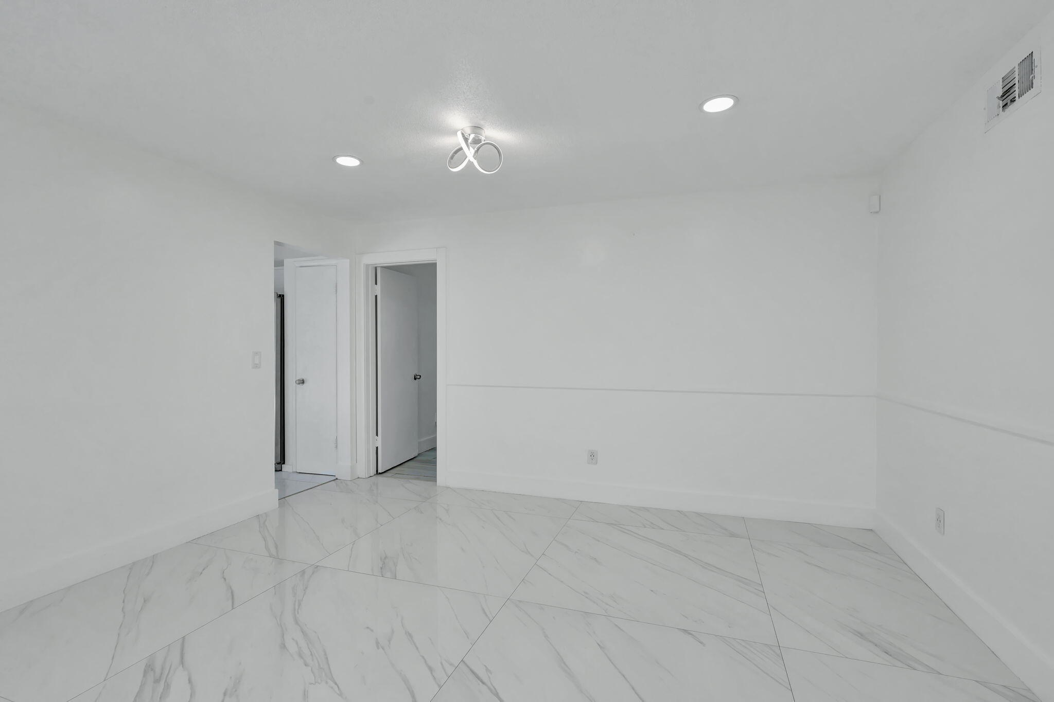 334 Southwest 13th Avenue Boynton Beach, FL 33435 - Photo 19 of 41 a view of an empty room
