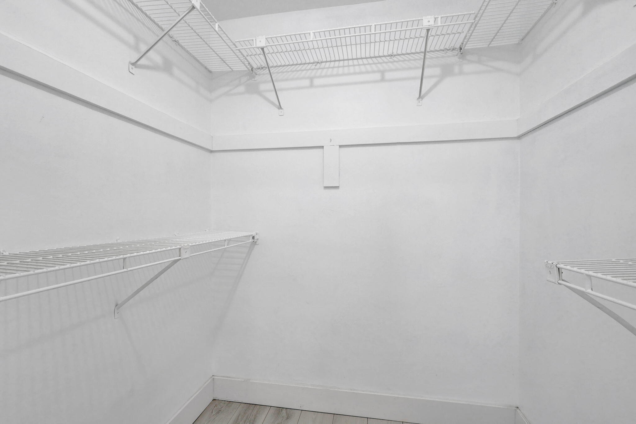 334 Southwest 13th Avenue Boynton Beach, FL 33435 - Photo 25 of 41 a view of a room with racks on the wall
