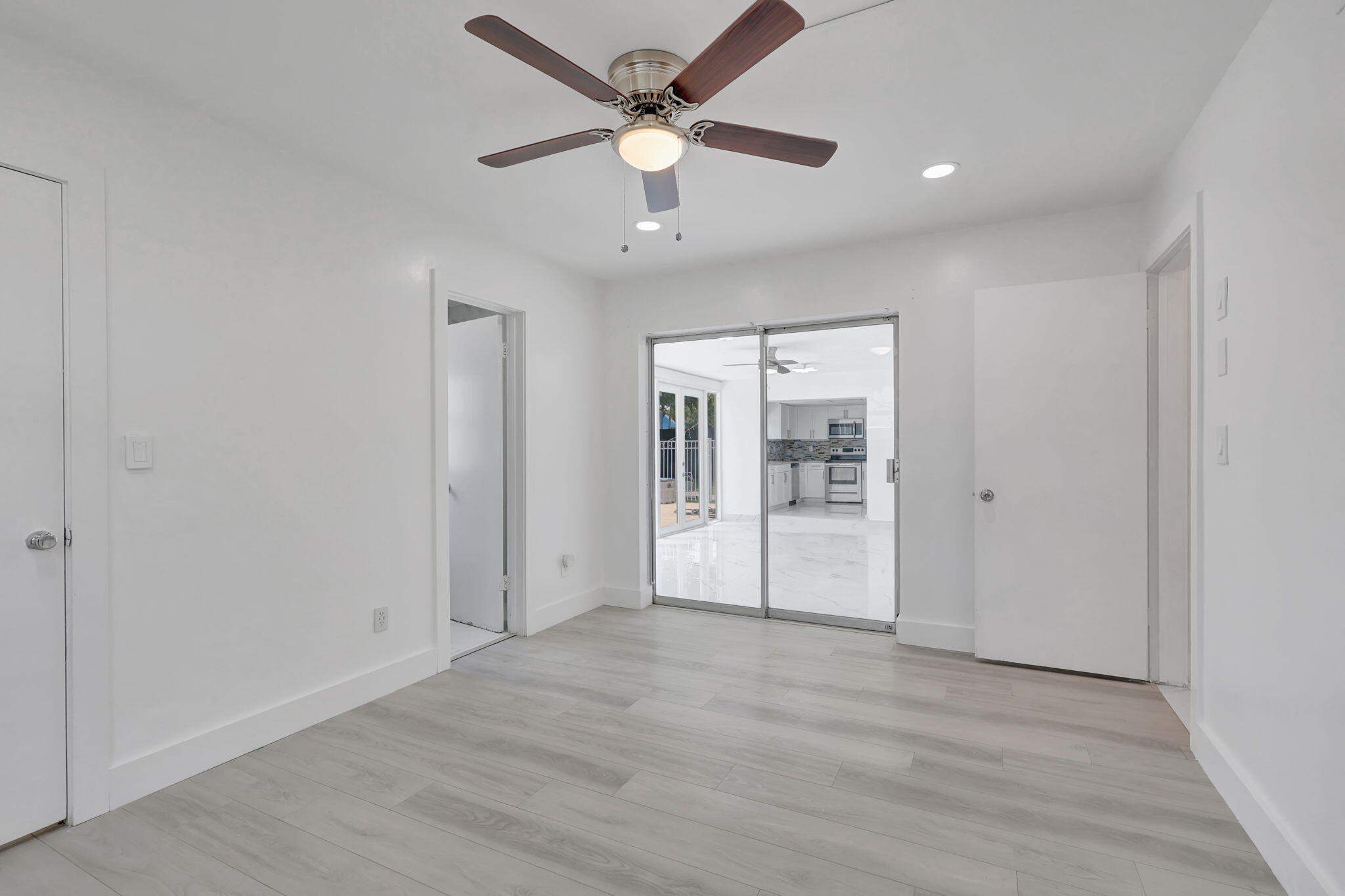 334 Southwest 13th Avenue Boynton Beach, FL 33435 - Photo 29 of 41 wooden floor in an empty room