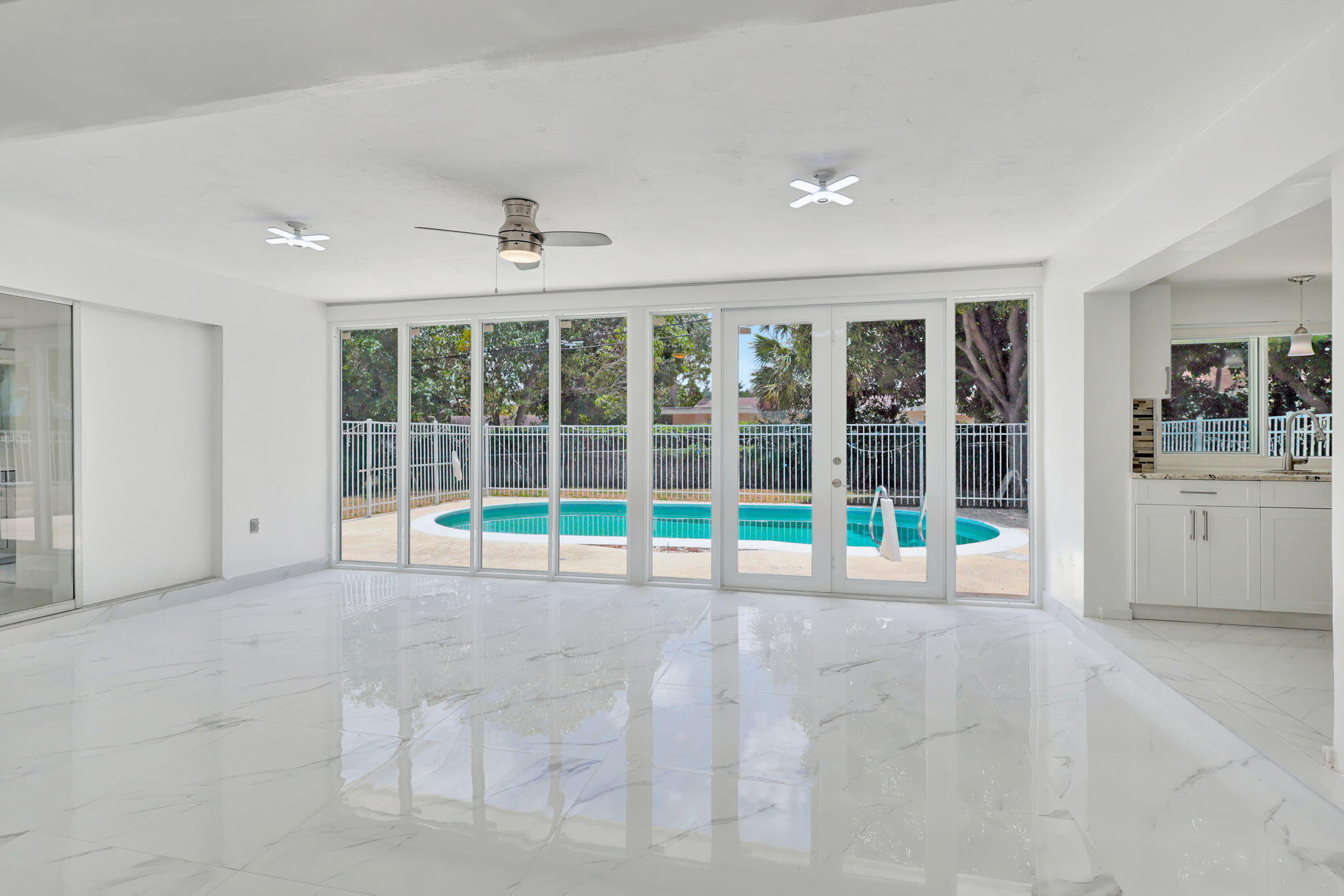 334 Southwest 13th Avenue Boynton Beach, FL 33435 - Photo 3 of 41 a view of an empty room with a window