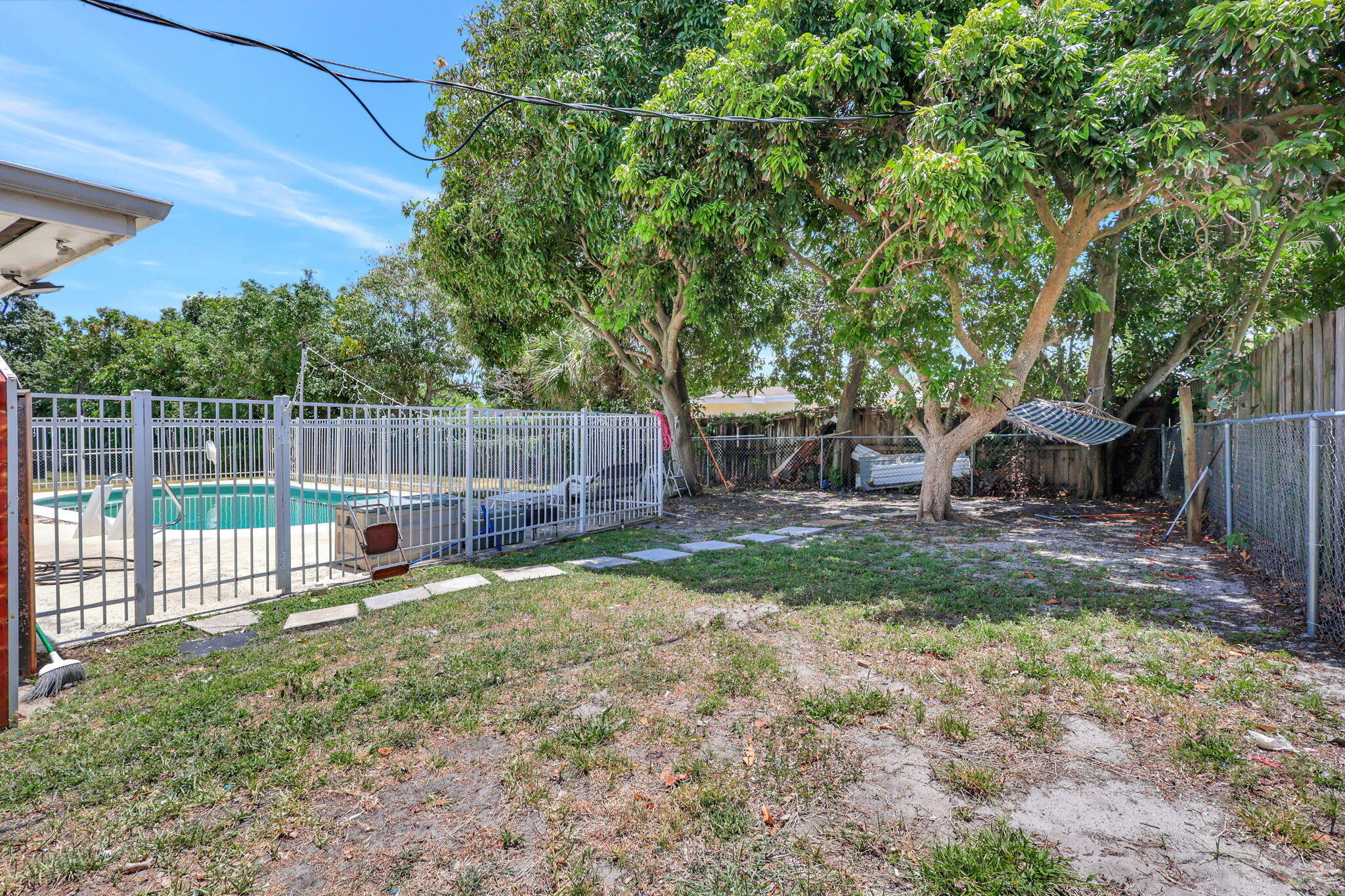 334 Southwest 13th Avenue Boynton Beach, FL 33435 - Photo 39 of 41 a view of a yard with a slide