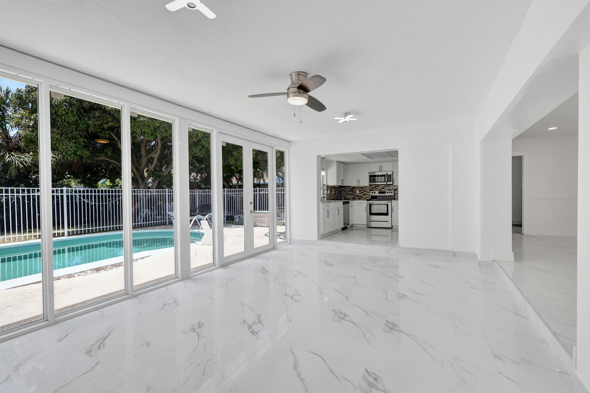 334 Southwest 13th Avenue Boynton Beach, FL 33435 - Photo 8 of 41 a view of livingroom with furniture and window