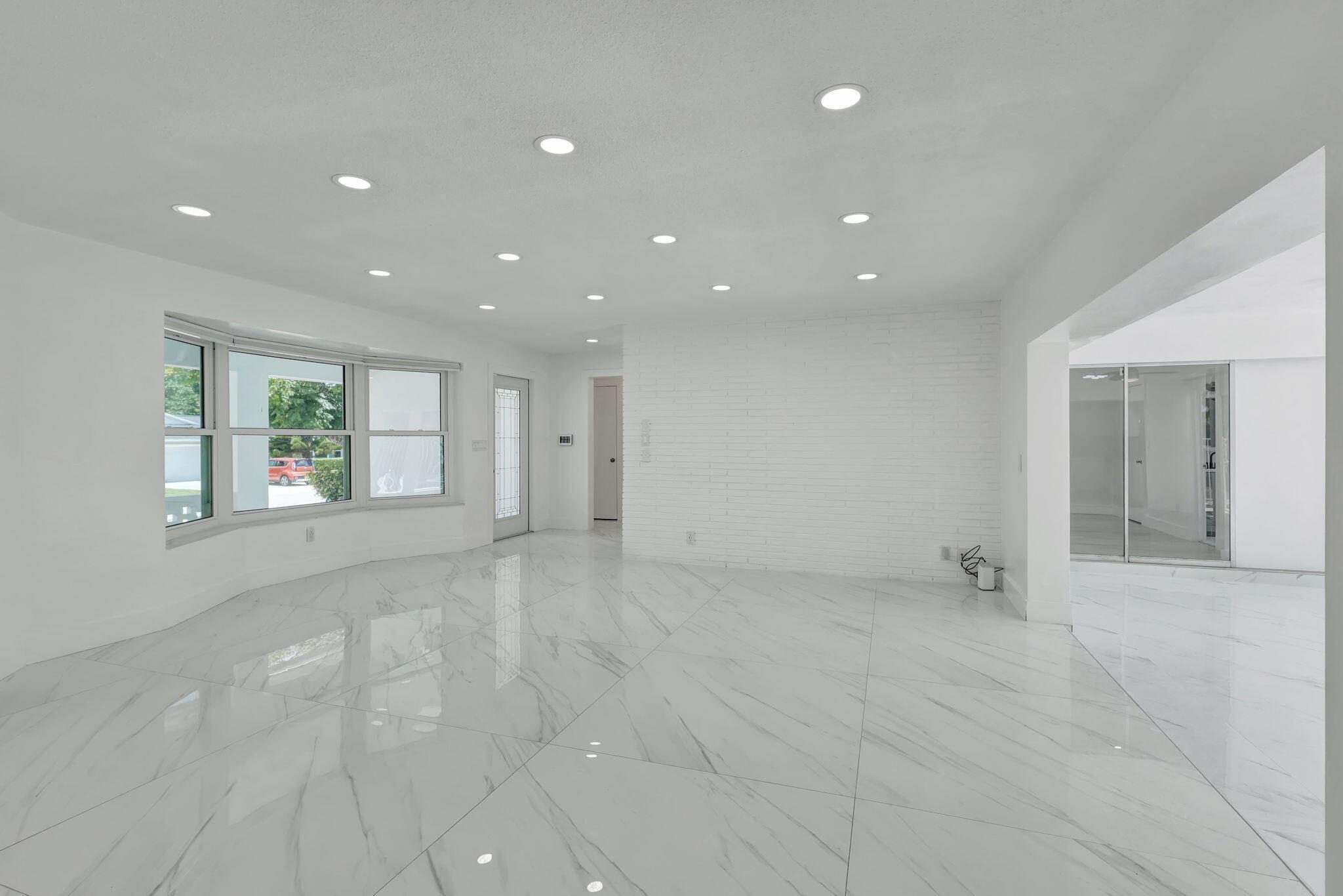 334 Southwest 13th Avenue Boynton Beach, FL 33435 - Photo 10 of 41 a view of an empty room with a window