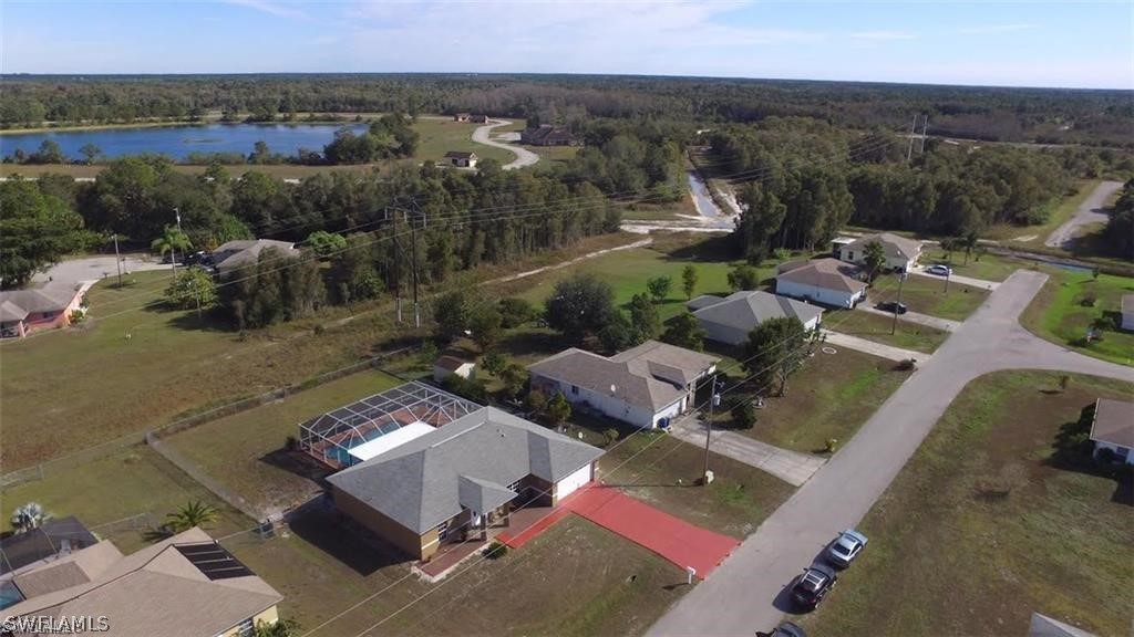 239 Rue Labonne Road Fort Myers, FL 33913 - Photo 21 of 22 an aerial view of a house with a yard