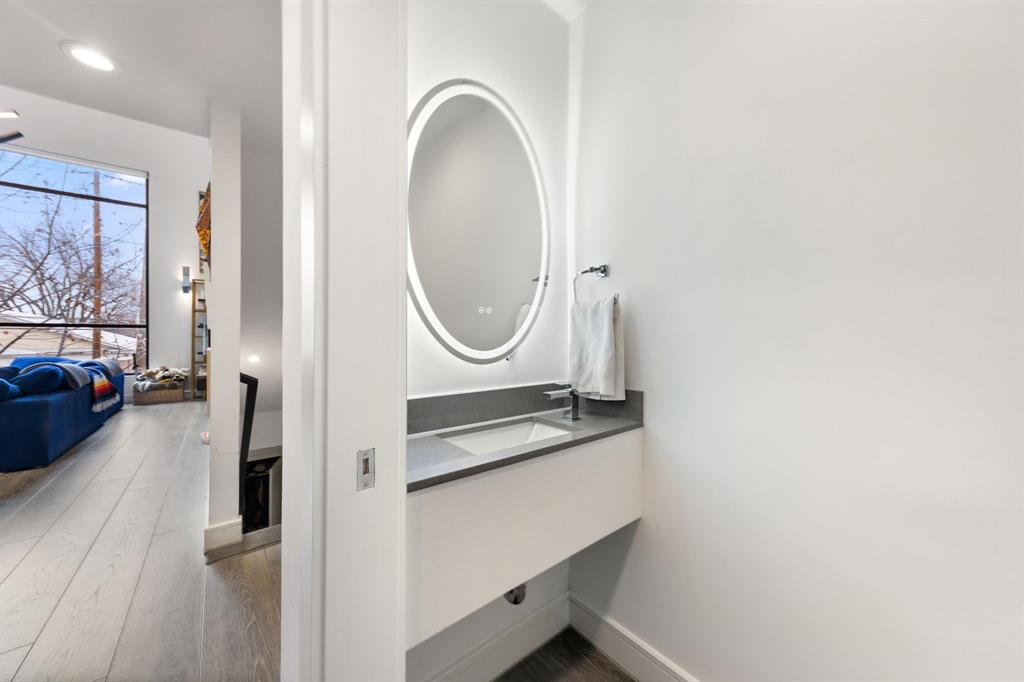 3880 Munger Avenue, Unit 2 Dallas, TX 75204 - Photo 10 of 29 a view of a livingroom with furniture and a fireplace