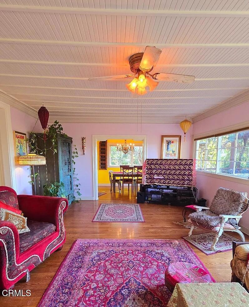 1450 McAndrew Road Ojai, CA 93023 - Photo 12 of 58 a living room with furniture and a large window