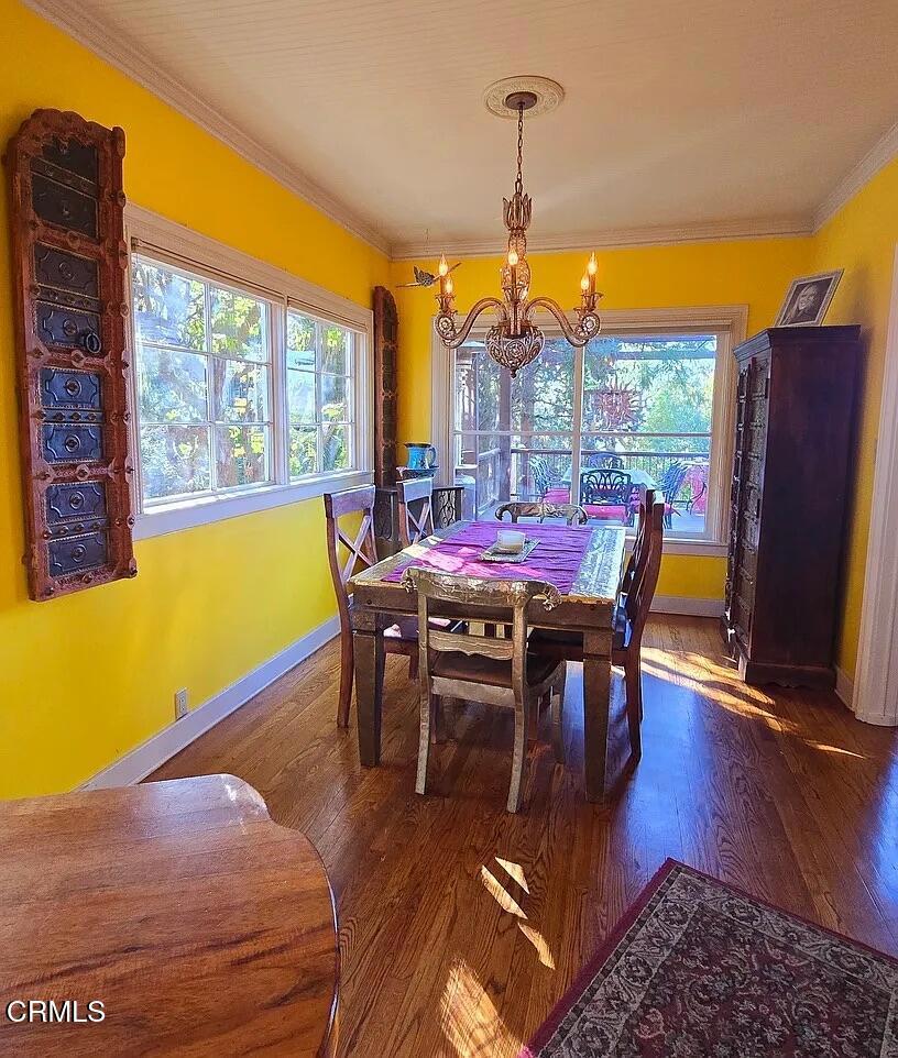 1450 McAndrew Road Ojai, CA 93023 - Photo 13 of 58 a view of a dining room with furniture window and wooden floor